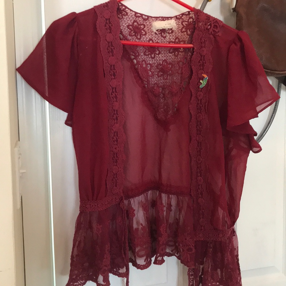 This is a cute rose colored lace cover up